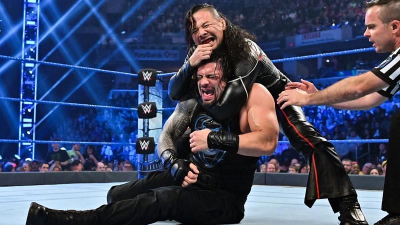 Roman Reigns and Shinsuke Nakamura on SmackDown