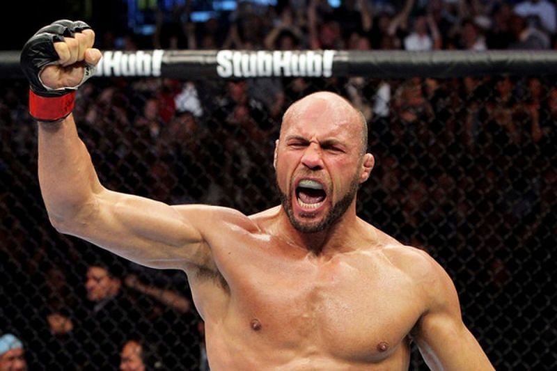 Randy Couture became the UFC&#039;s first double champion in 2003 but never held his titles simultaneously.