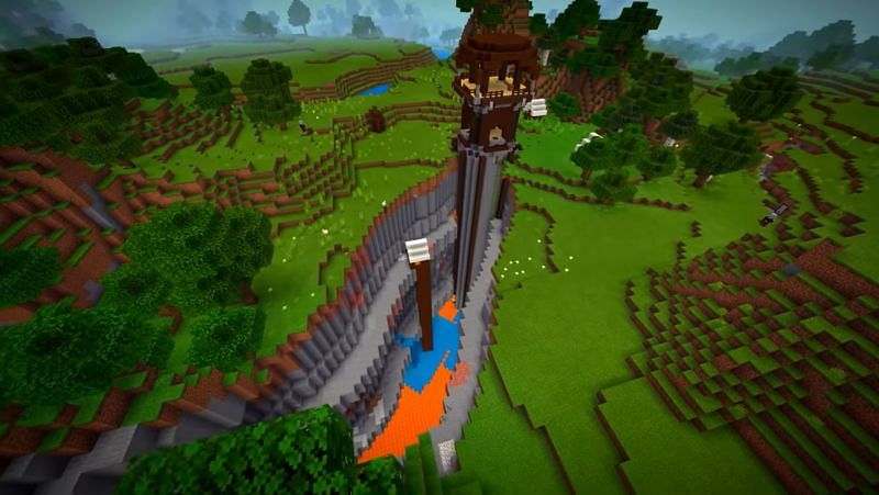 A tall pillager outpost and nearby tent that generated in the middle of a ravine (Image via Minecraft &amp; Chill/YouTube)