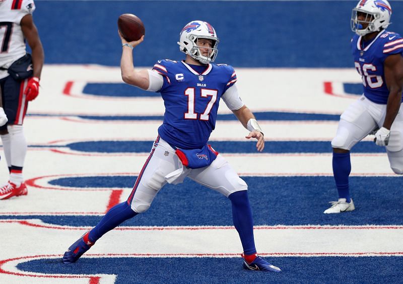 Buffalo Bills quarterback Josh Allen fires the football from his own endzone against Patriots