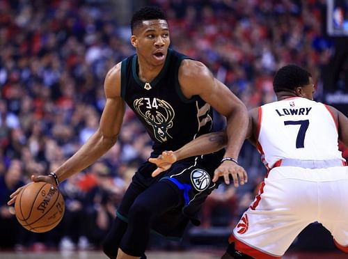 Milwaukee Bucks' Giannis Antetokounmpo and Toronto Raptors' Kyle Lowry.