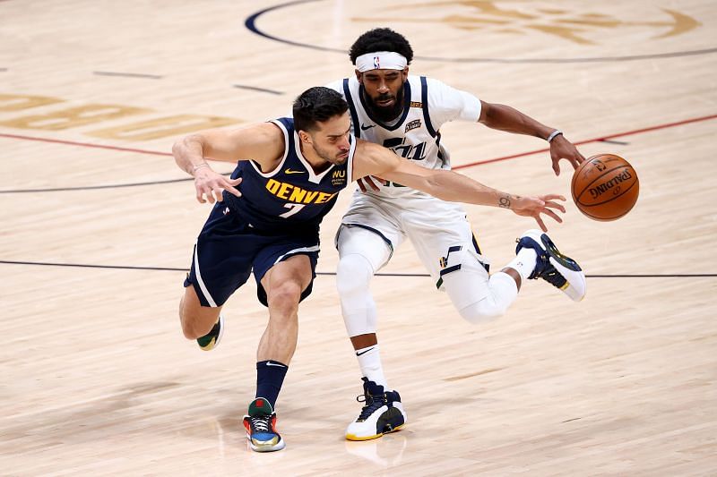 Facundo Campazzo (#7 )of the Denver Nuggets defends against Mike Conley (#10) of the Utah Jazz.