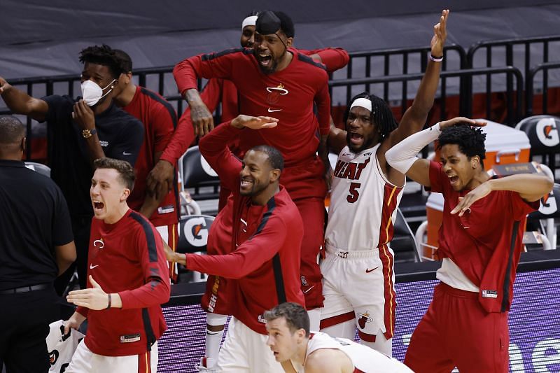 The Miami Heat bench reacts to a dunk by Kendrick Nunn&nbsp;.