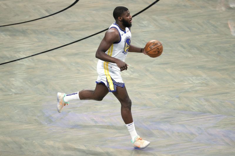 Eric Paschall #7 of the Golden State Warriors dribbles during the first half against the Brooklyn Nets.