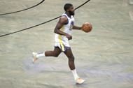 Eric Paschall #7 of the Golden State Warriors dribbles during the first half against the Brooklyn Nets.