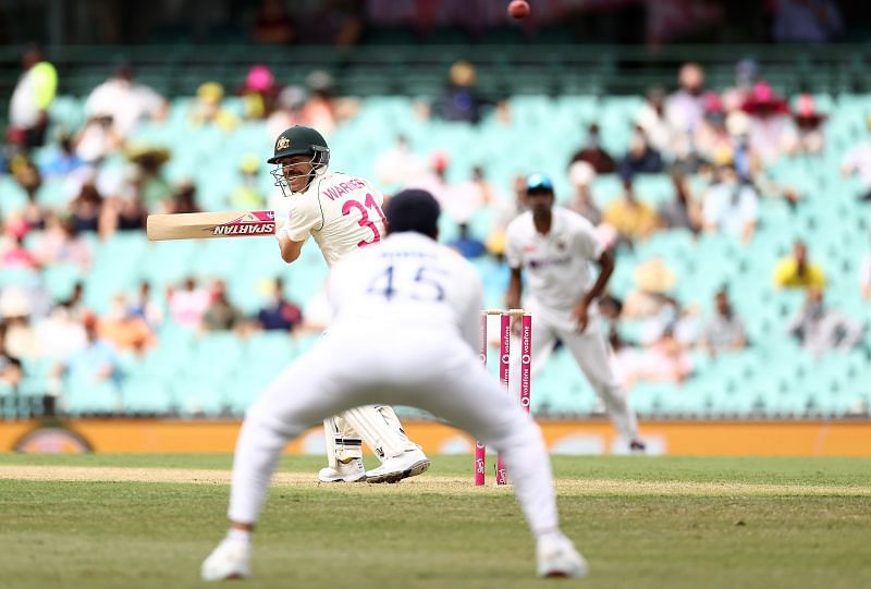 David Warner was caught at first slip by Cheteshwar Pujara.