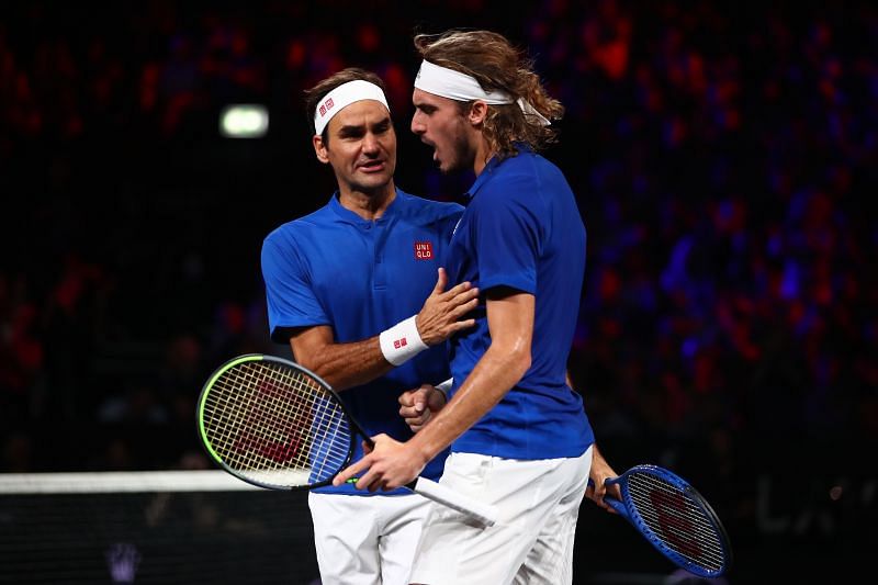 Roger Federer (L) and Stefanos Tsitsipas at Laver Cup 2019