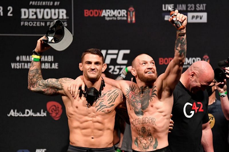 Dustin Poirier (left) and Conor McGregor (right) at the UFC 257 ceremonial weigh-ins.