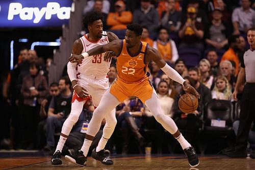 Deandre Ayton of the Phoenix Suns handles the ball against Houston Rockets during an NBA game 