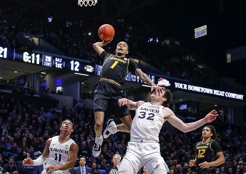 Xavier Pinson #1 of the Missouri Tigers goes up for a dunk attempt