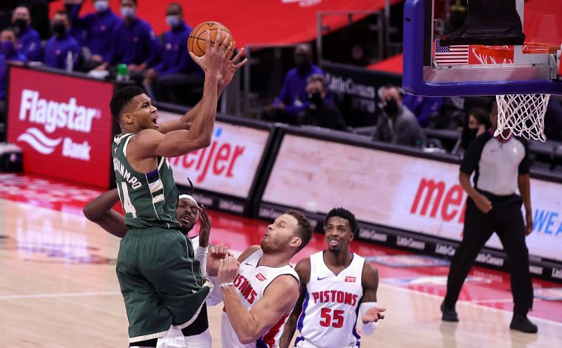 Giannis Antetokounmpo #34 of the Milwaukee Bucks goes up for a shot over Blake Griffin #23 of the Detroit Pistons at Little Caesars Arena on January 13, 2021 (Photo by Leon Halip/Getty Images)