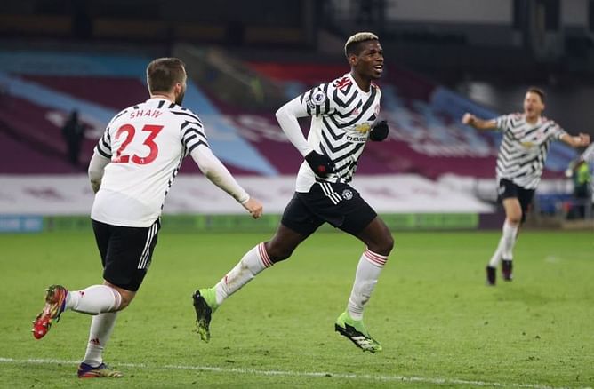Exceptional Paul Pogba rolls back the years to send Manchester United to Premier League summit