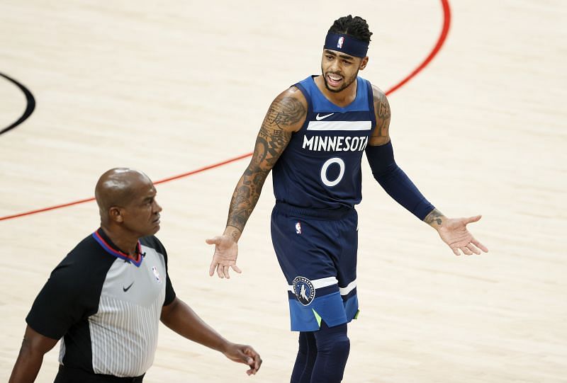 D&#039;Angelo Russell #0 of the Minnesota Timberwolves reacts toward the referee.