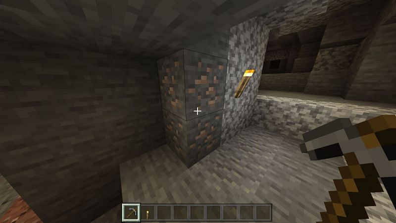 Passo 1 per fare un secchio in Minecraft