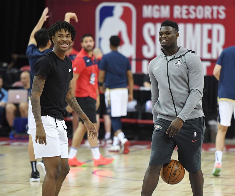 Ja Morant (L) of the Memphis Grizzlies and Zion Williamson #1 of the New Orleans Pelicans shoot during warmups.