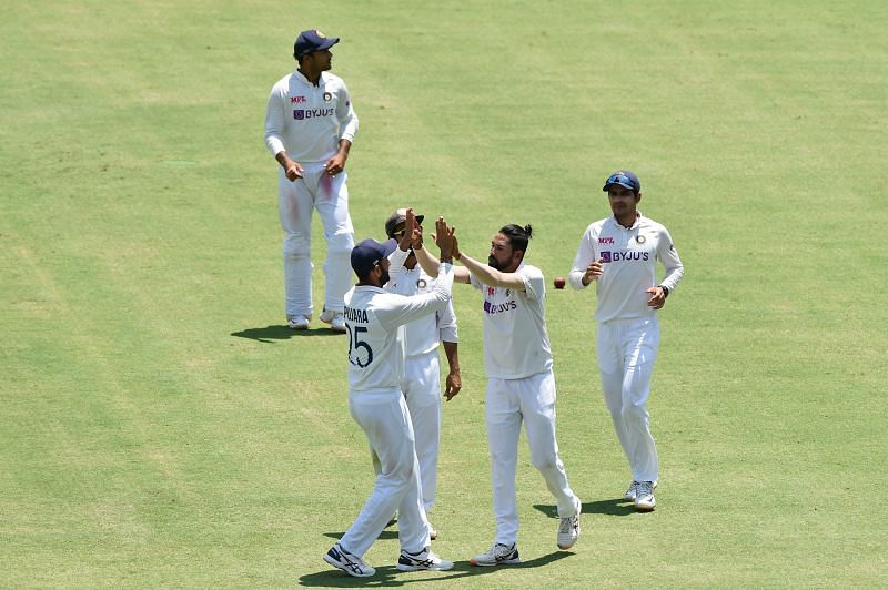 Team India celebrating a fall of wicket.
