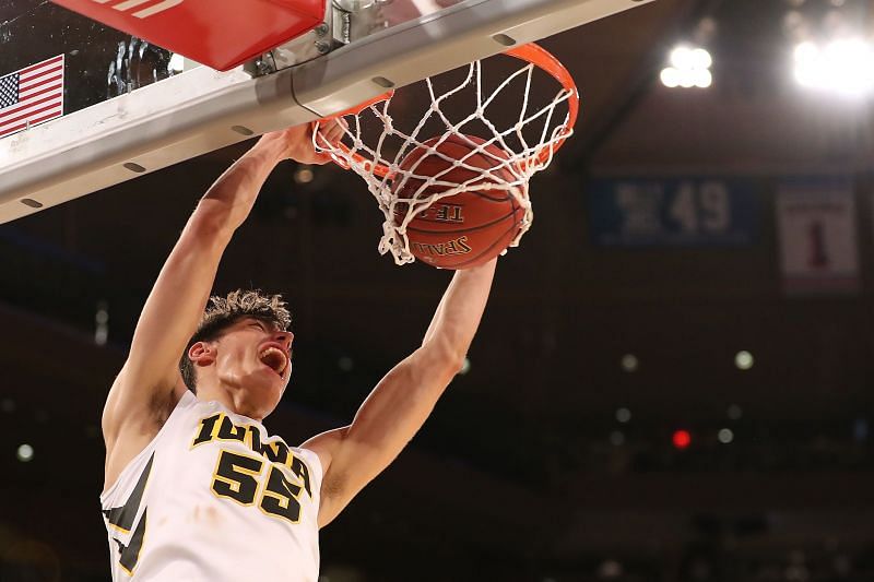 Luka Garza of the Iowa Hawkeyes dunks