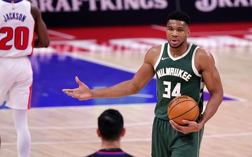 Giannis talks to the referee in a game against the Detroit Pistons