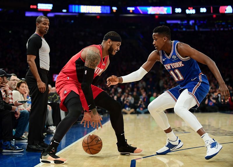 Carmelo Anthony (left) of the Portland Trail Blazers is guarded by Frank Ntilikina (right) of the New York Knicks