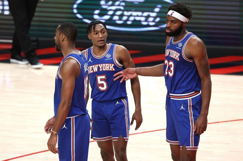 Alec Burks (#18), Immanuel Quickley (#5) and Mitchell Robinson (#23) of the New York Knicks&nbsp;