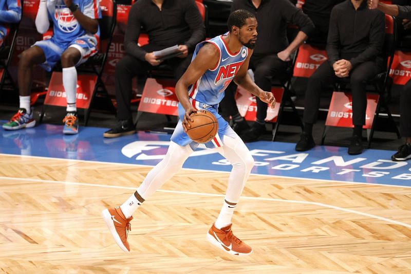 Kevin Durant brings the ball upcourt against the Denver Nuggets 