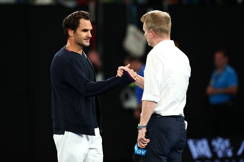 Roger Federer with Jim Courier at the 2020 Australian Open