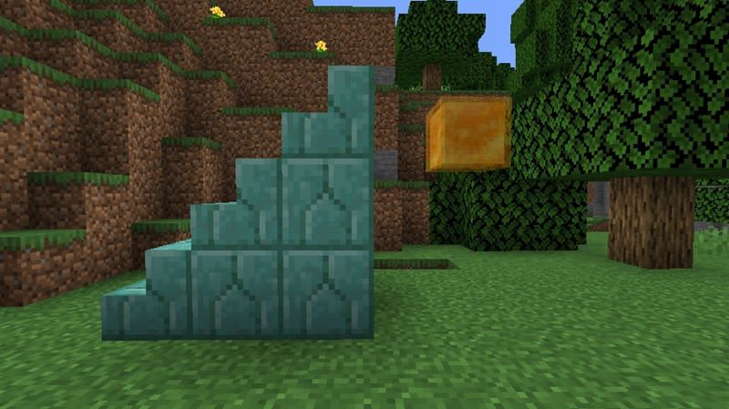 A staircase leading up to a honey block for the &quot;Sticky Situation&quot; achievement in Minecraft. (Image via Minecraft)