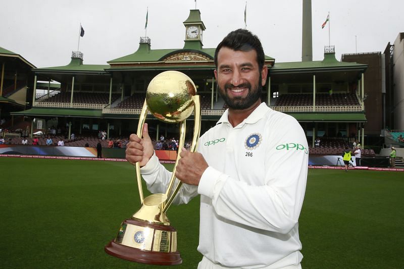 Cheteshwar Pujara with the Border-Gavaskar Trophy