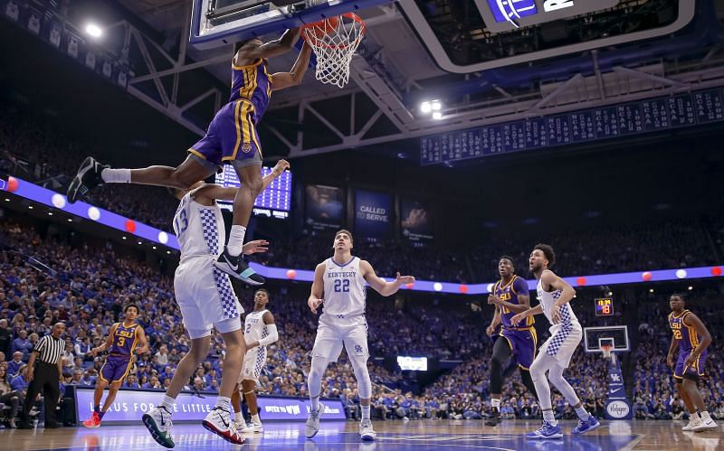 Marlon Taylor of the LSU Tigers dunks the ball during an alley-oop against the Kentucky Wildcats.