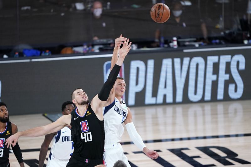 Ivica Zubac of the LA Clippers and Kristaps Porzingis of the Dallas Mavericks battle for the tip off in game two of the first round of the NBA playoffs&nbsp;