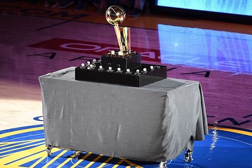 A view of the Golden State Warriors 2017-2018 Championship rings and the Larry O'Brien NBA Championship Trophy.