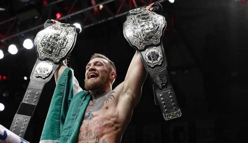Conor McGregor posing as the UFC champ-champ at UFC 205