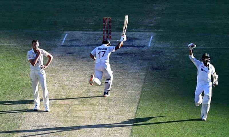 Navdeep Saini (R) and Rishabh Pant share the winning moment at the Gabba.