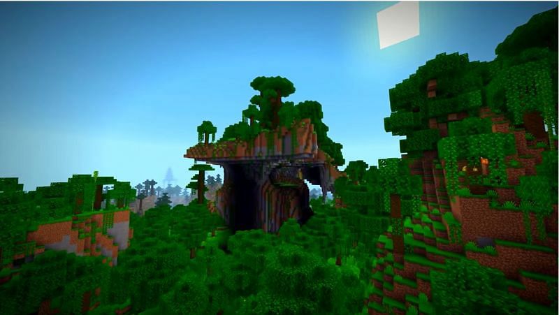 A mountain in the midst of a jungle biome that is filled with life. (Image via Minecraft &amp; Chill/YouTube)