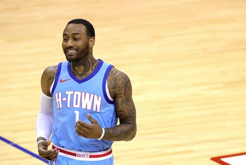 John Wall #1 of the Houston Rockets reacts to the Washington Wizards bench during the fourth quarter at Toyota Center on January 26, 2021 in Houston, Texas. (Photo by Carmen Mandato/Getty Images)