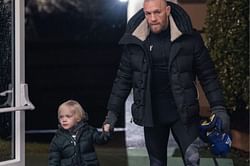 Conor McGregor signature: Watch the 'Notorious' and his son sign UFC 257 posters together!