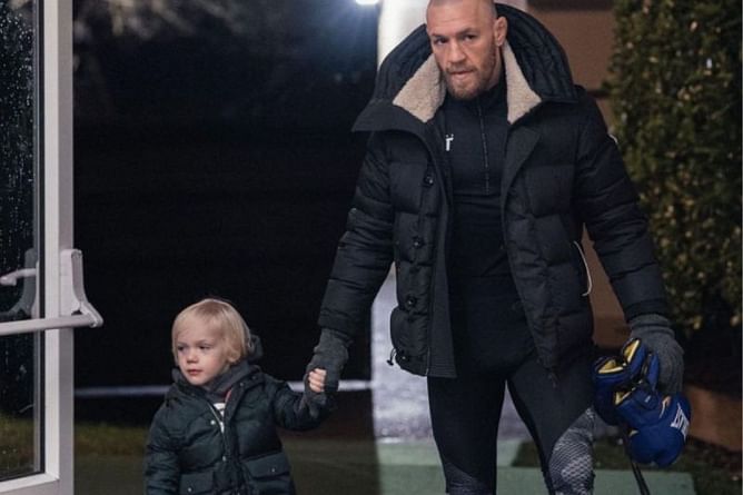 Conor McGregor signature: Watch the 'Notorious' and his son sign UFC 257 posters together!
