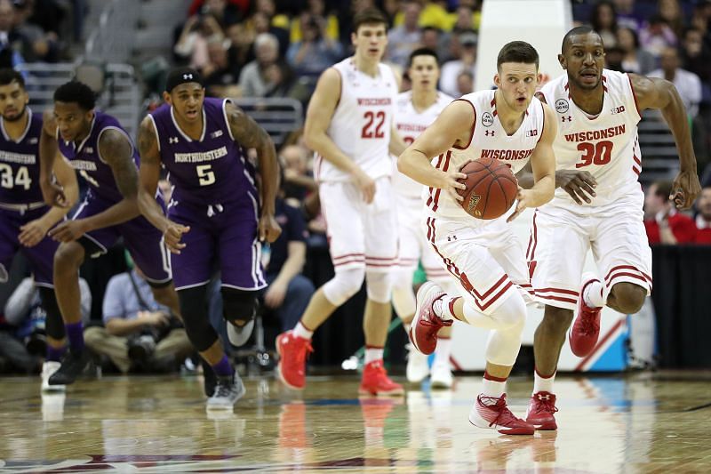 &nbsp;The Wisconsin Badgers dribbles up the court against the Northwestern Wildcats.