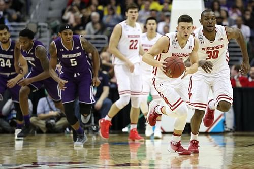  The Wisconsin Badgers dribbles up the court against the Northwestern Wildcats.