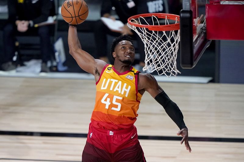 Donovan Mitchell of the Utah Jazz dunks against the Denver Nuggets