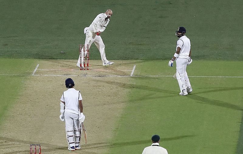 A disappointed Virat Kohli looks back to Ajinkya Rahane after getting run out in Adelaide.