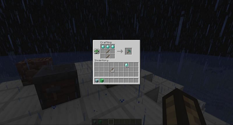 Crafting a diamond pickaxe in Minecraft