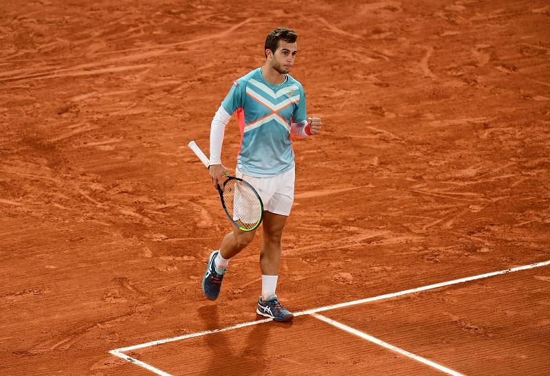 Hugo Gaston celebrates a point against Dominic Thiem