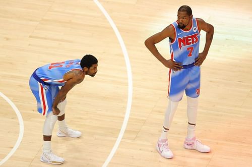 Brooklyn Nets' Kevin Durant (#7) and Kyrie Irving (#11) awaiting tipoff