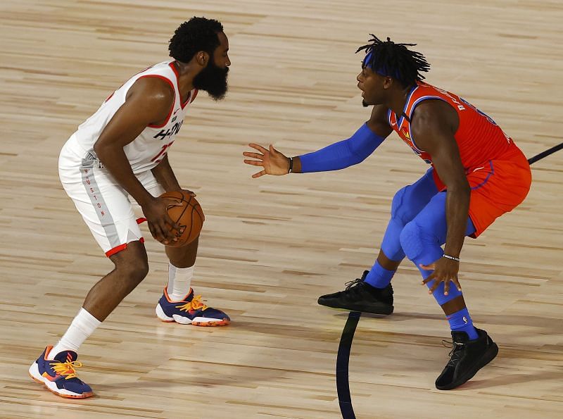 James Harden #13 of the Houston Rockets drives against Luguentz Dort #5 of the Oklahoma City Thunder&nbsp;