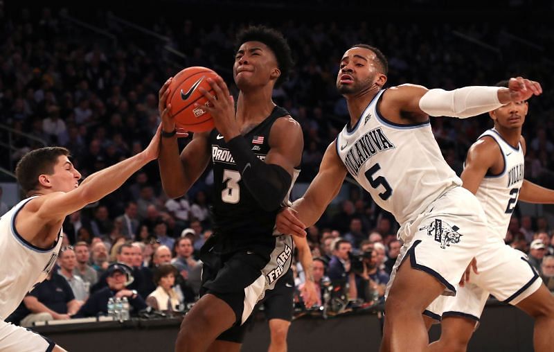 David Duke #3 of the Providence Friars drives to the basket against