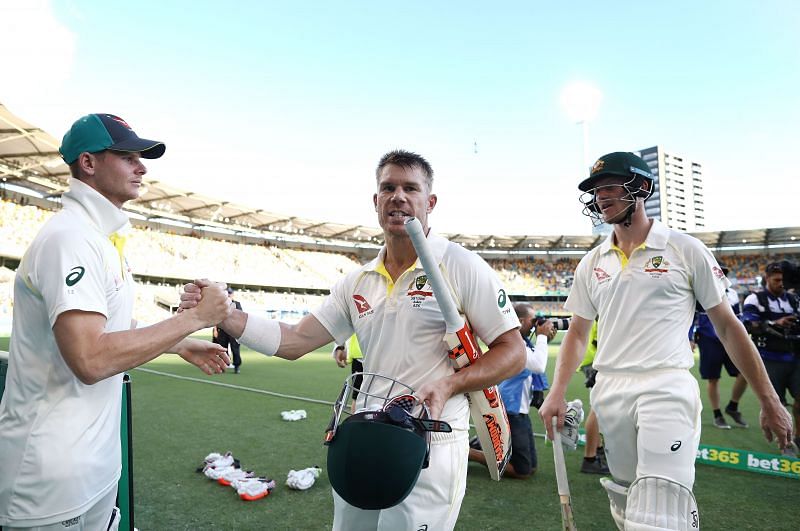 David Warner (C) has plundered runs for fun at the Gabba