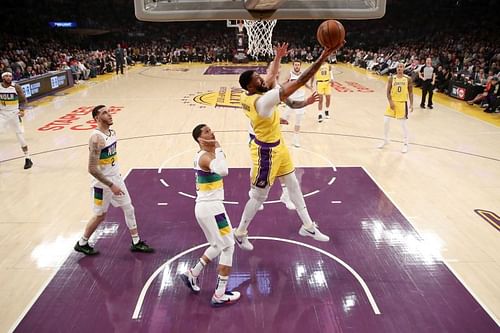 Anthony Davis goes to the basket in a game against the New Orleans Pelicans. 