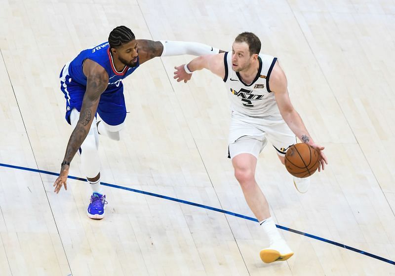 Joe Ingles #2 of the Utah Jazz drives past Paul George #13 of the LA Clippers during a game at Vivint Smart Home Arena on January 1, 2021 (Photo by Alex Goodlett/Getty Images)