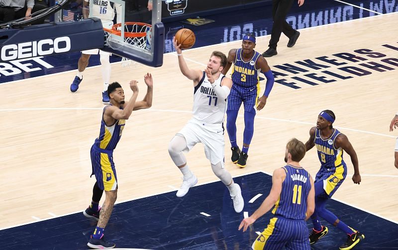 Luka Doncic of the Dallas Mavericks shoots the ball against the Indiana Pacers at Bankers Life Fieldhouse.